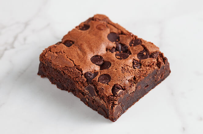 A fudgy brownie square with a rich and gooey texture.
