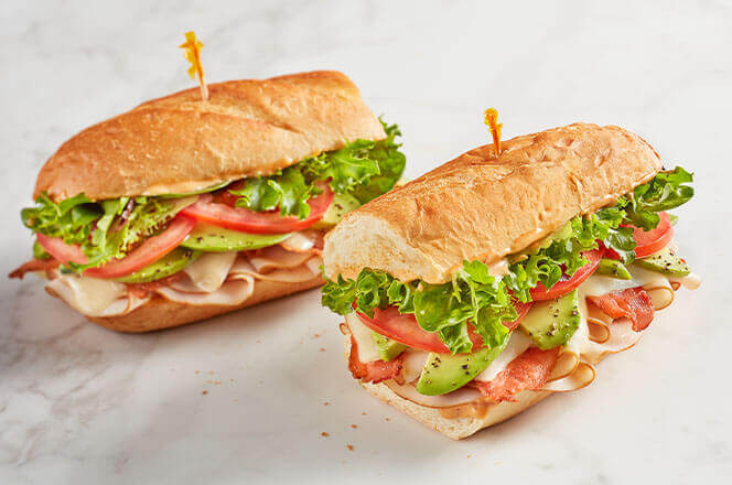 A 12-inch Spicy Turkey sub with turkey, jalapeño peppers, pepper jack cheese, lettuce, and chipotle ranch on toasted bread.