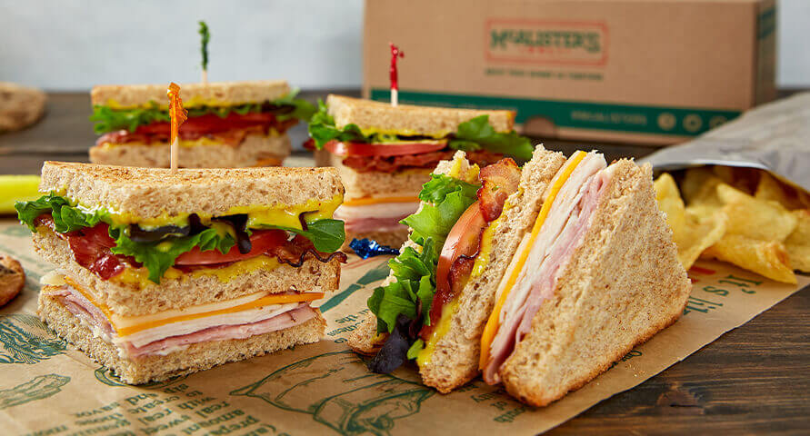 https://www.mcalistersdeli.com/-/media/mcalisters/pages/catering/box-lunches/mca_423628_catering-menu-image_box-lunches_club_891x480.jpg?v=1&d=20200706T071858Z&la=en&h=480&w=891&hash=C97971870135AAC0AED4DC856CC2A74E